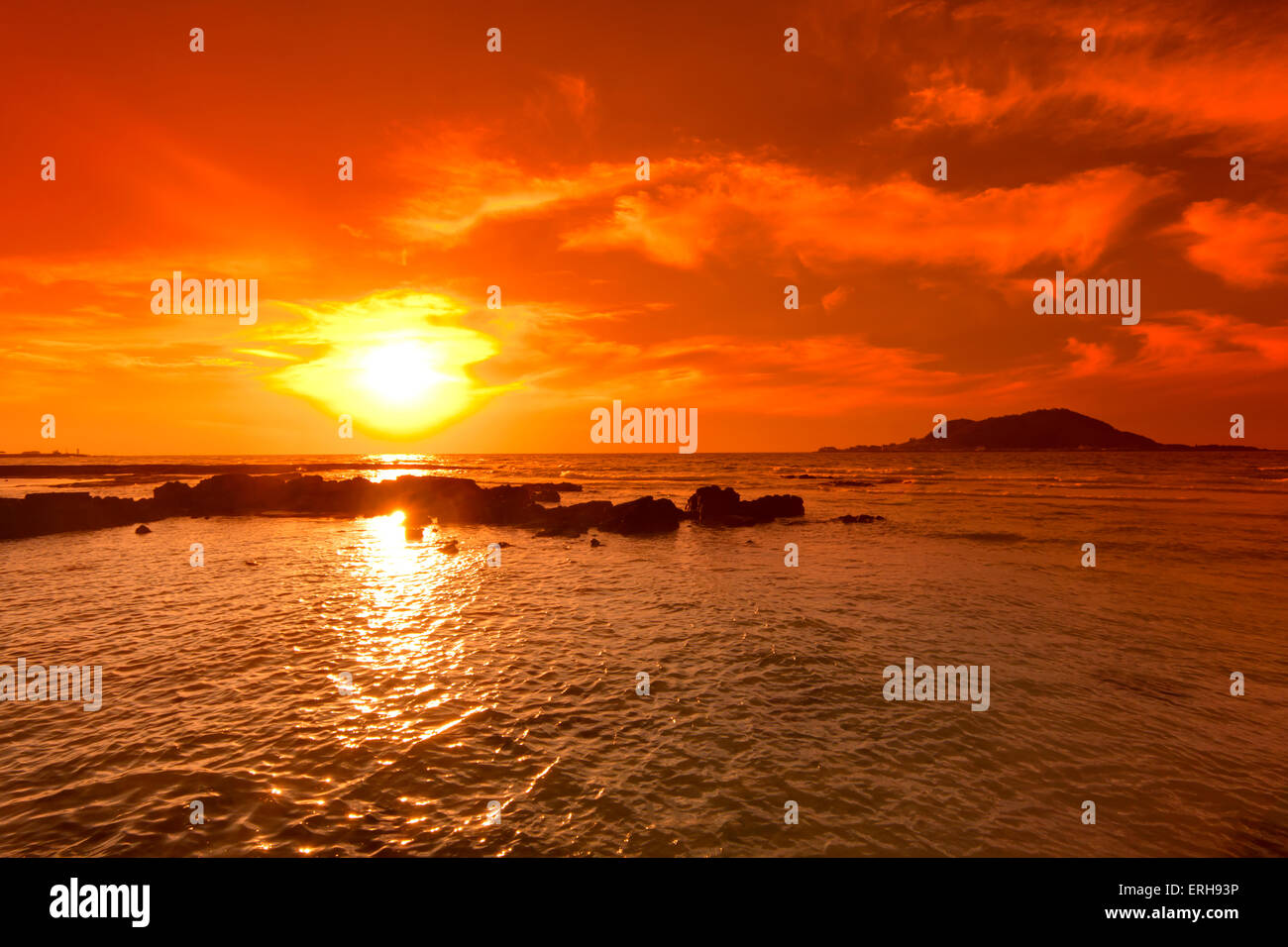 Sunset seascape and volcano, Cheju island, Korea. Stock Photo