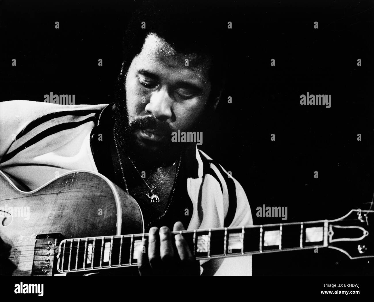 Melvin ' WahWah Watson ' Ragin performing, playing his guitar, in 1976