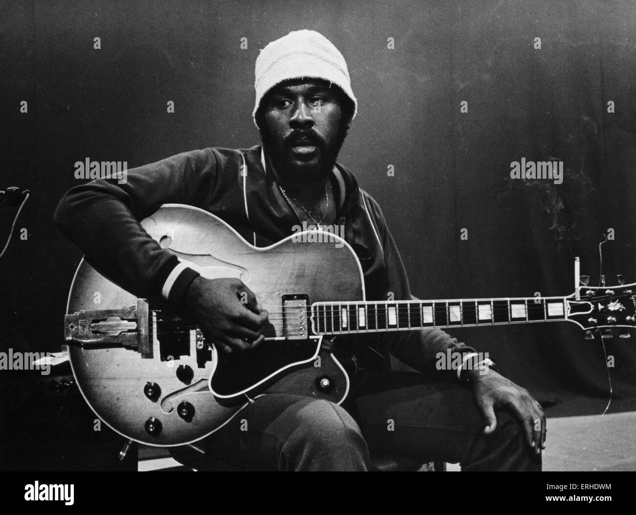 Melvin ' WahWah Watson ' Ragin portrait with his guitar, in 1976
