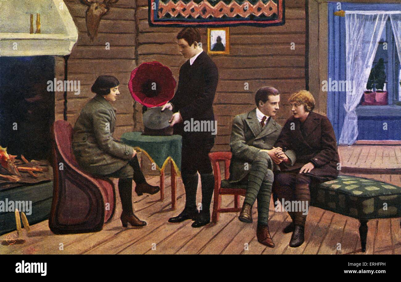 Early gramophone in photo on Norwegian postcard of young people listening to record on a gramophone, early thirties. Stock Photo
