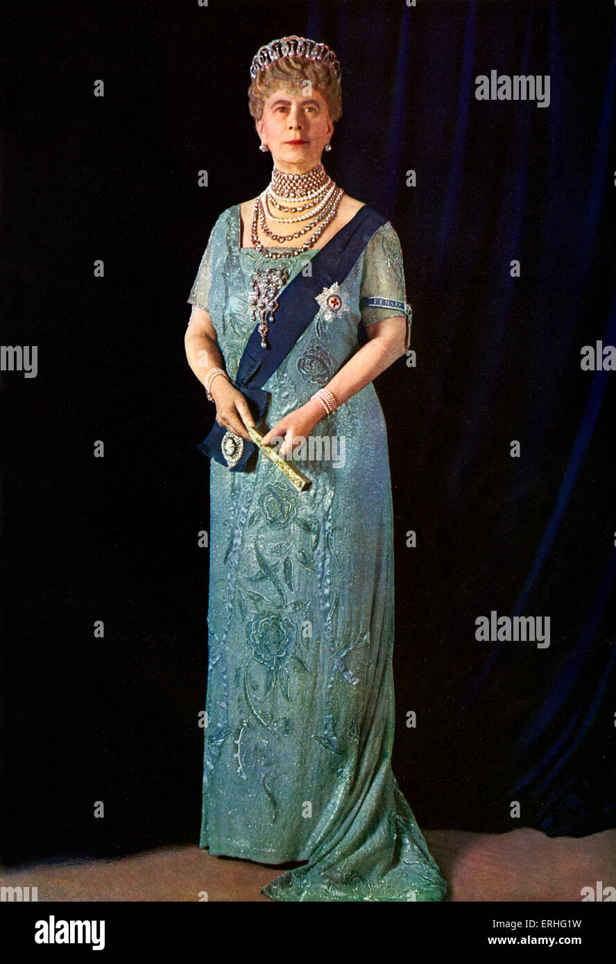 Queen Mary - in sash and tiara, holding fan, official portrait photograph of 1935.  Illustrated London News Silver Jubilee. Stock Photo