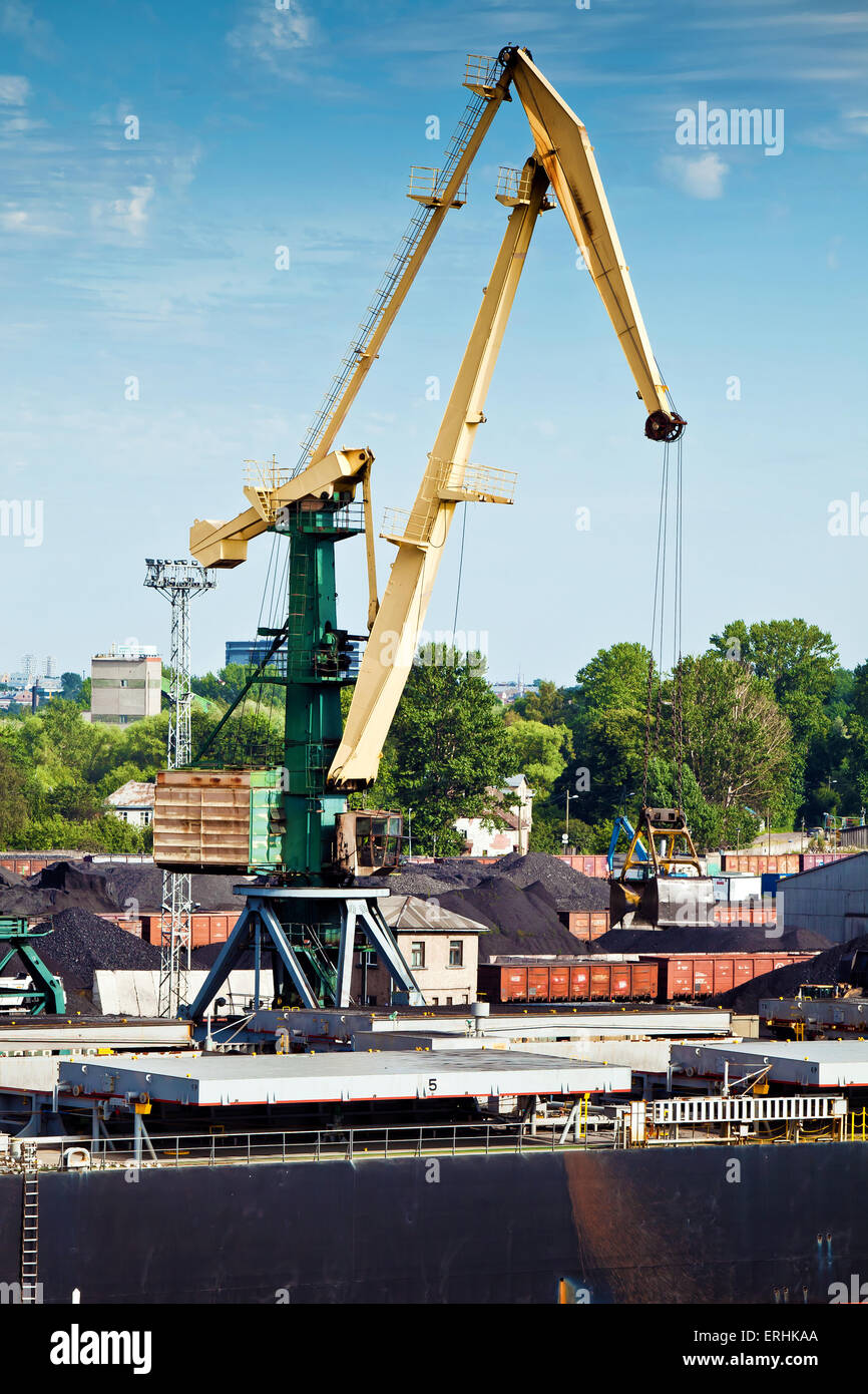 Cargo harbor infrastructure. Crane in a sea port Stock Photo