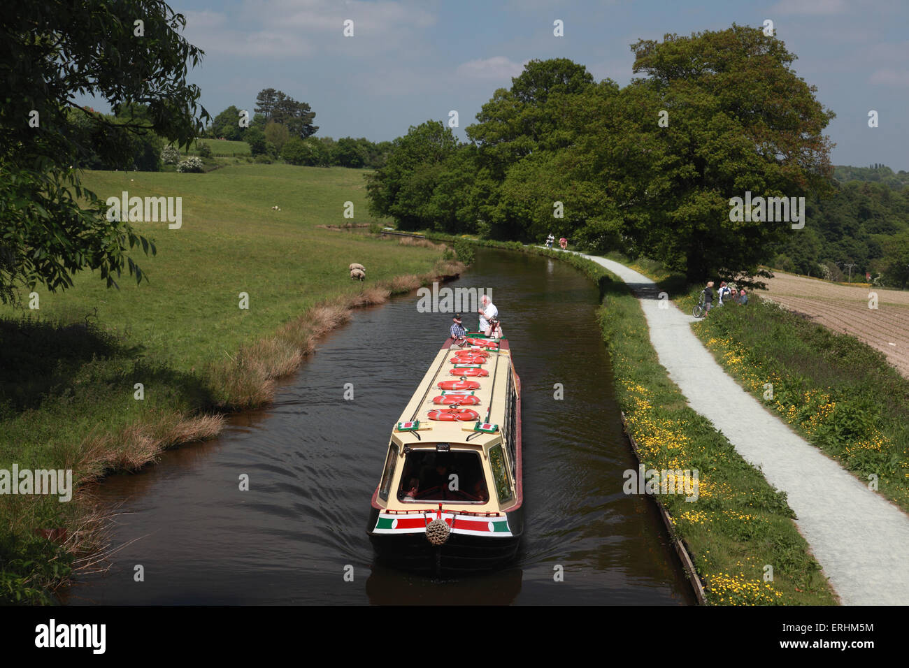 The trip boat, Thomas Telford, based at Llangollen Wharf travelling on the Llangollen canal by Millars Bridge Stock Photo