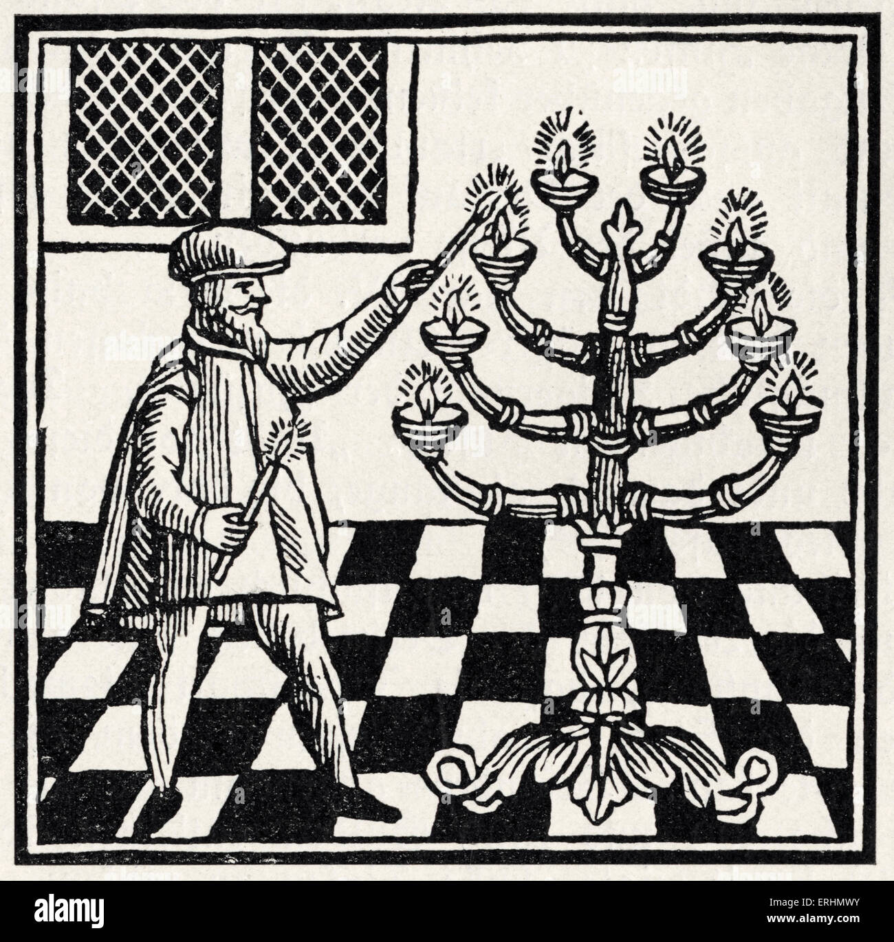 Lighting the menorah / hanukiah (8 branched candlestick) at Hanukah