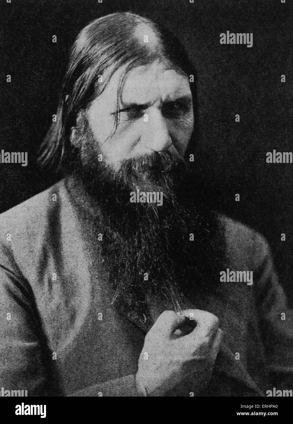 Grigori Rasputin - Russian mystic involved with last Tsar of Russia: 22 January 1869 - 19 December 1916. Photograph in Bookman, Stock Photo