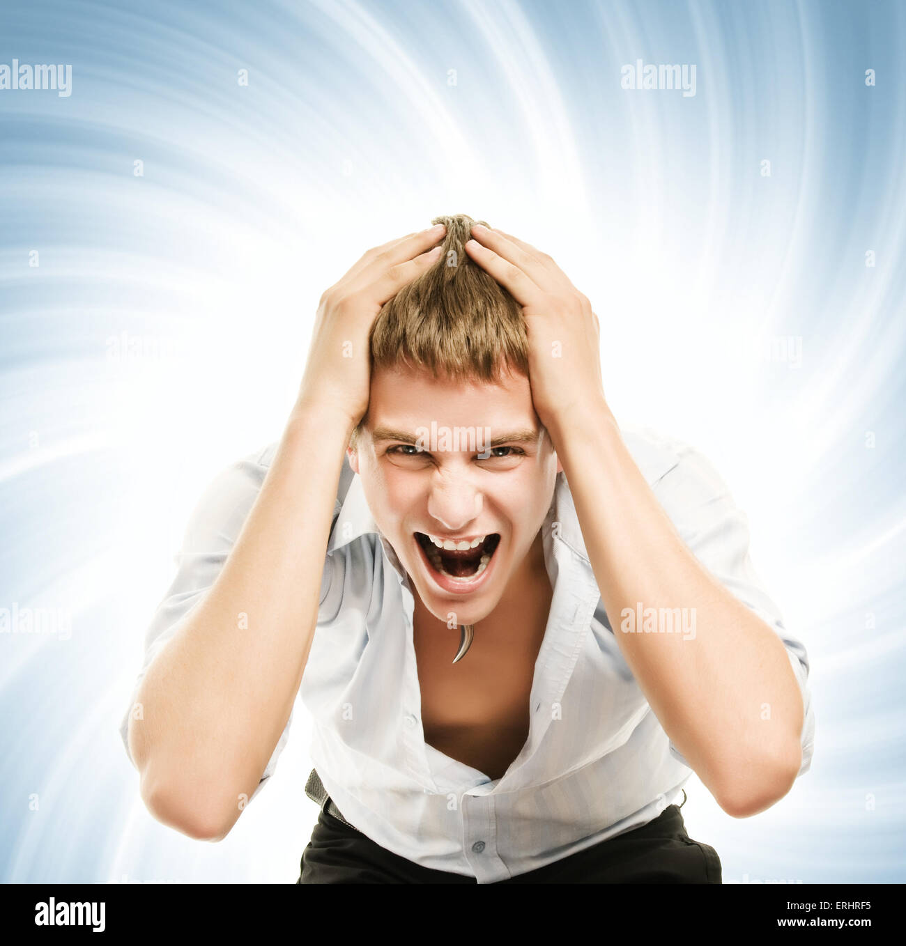 Screaming young handsome man over abstract blue background Stock Photo ...