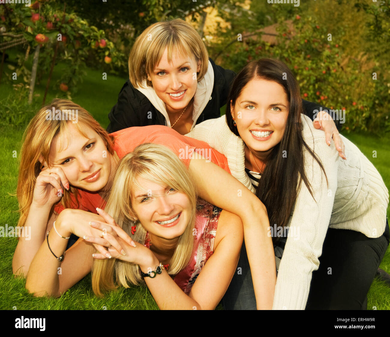 Group of happy friends having fun outdoors Stock Photo - Alamy
