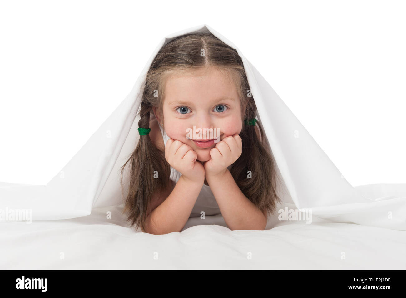 cheerful girl hiding under the blanket Stock Photo Alamy
