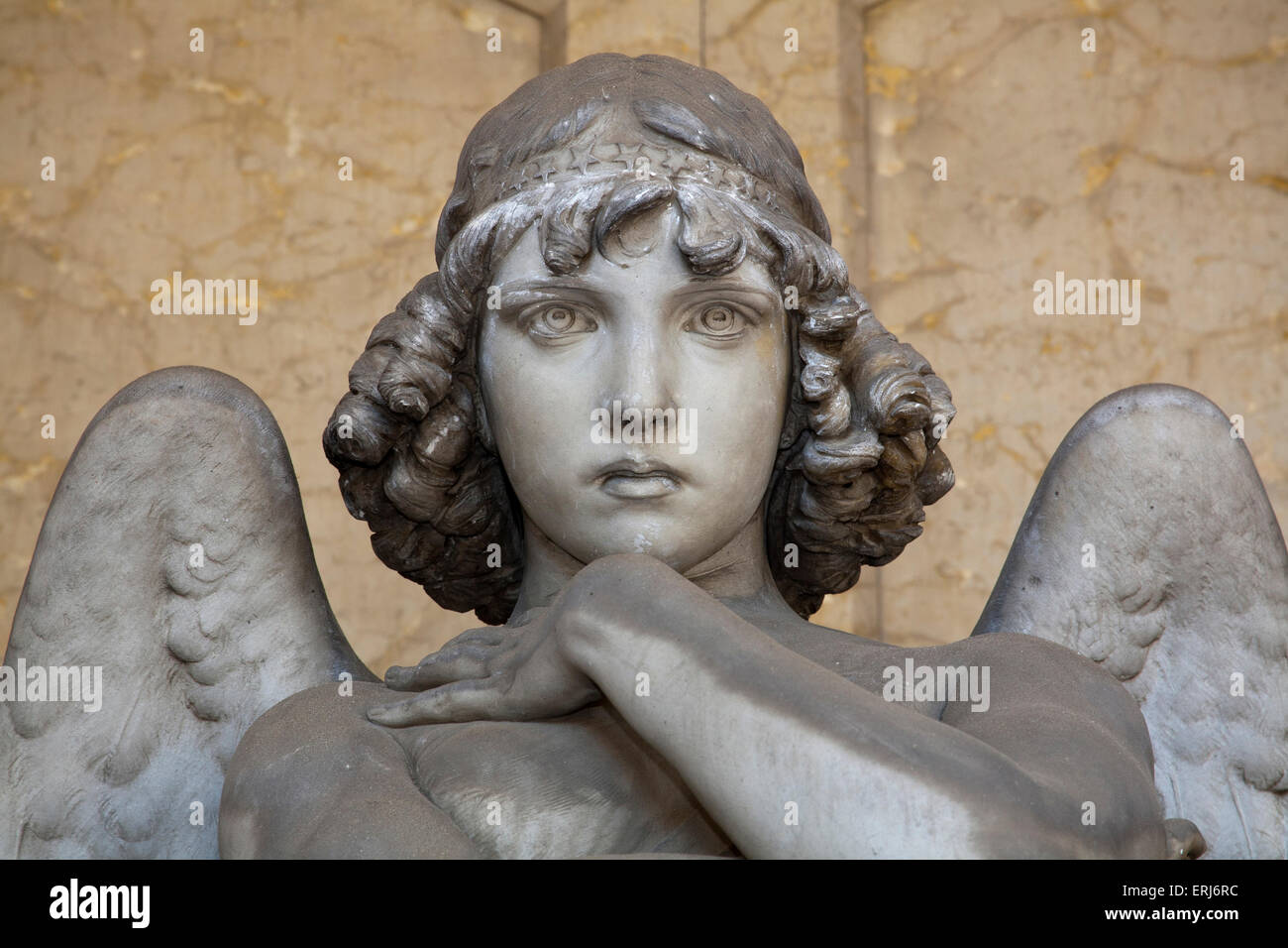 portrait of loving angel on marble, in monumental cemetery of Genoa, more than 100 years old statue Stock Photo