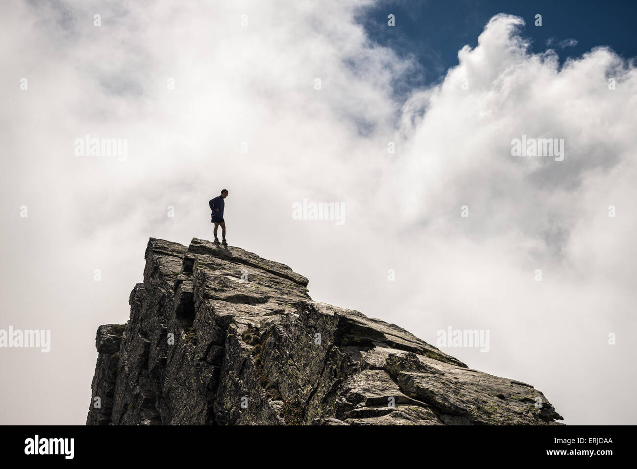Hiker standing on steep hi-res stock photography and images - Alamy