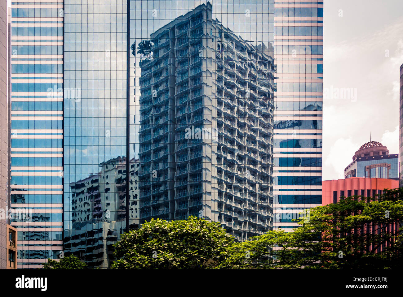 High-rise building reflections on another building. Kuala Lumpur, Malaysia. Stock Photo