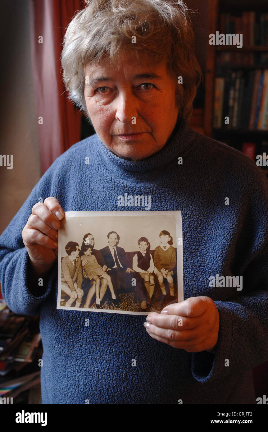 Widow Clare Crowhurst holds the last photograph taken of her husband Donald  with his family Stock Photo - Alamy