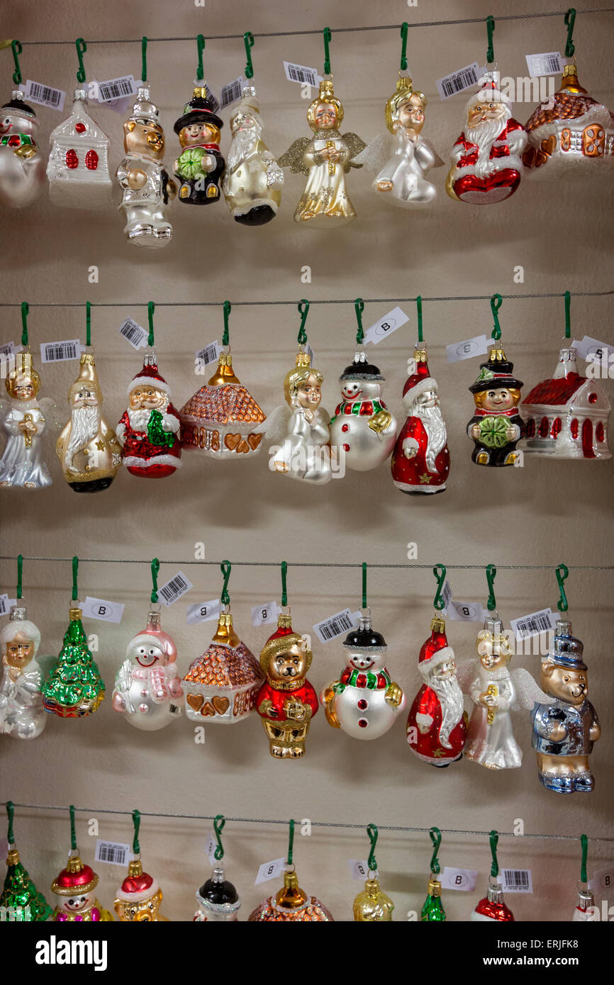 Worker completes glass ornaments in Slezska Tvorba factory in Opava, Czech  republic, May 29, 2015. Slezska Tvorba manufacture produce hand-blown and  painted glass Christmas tree ornaments to the Czech Republic and exports
