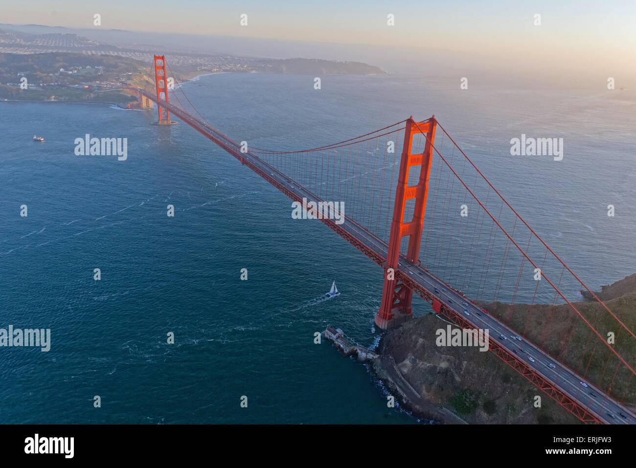Aerial view over San Francisco and the Golden Gate Bridge at sunset Stock Photo