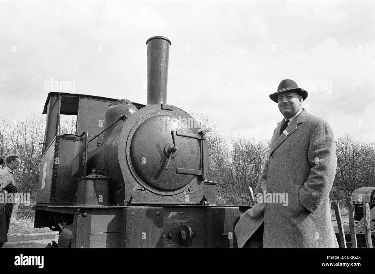 Dr Richard Beeching, Chairman of British Railways, Photo-call visiting the Bluebell Line in Sussex, England, 1st April 1962. He became a household name in Britain in the early 1960s for his report 'The Reshaping of British Railways', commonly referred to as 'The Beeching Report', which led to far- reaching changes in the railway network, popularly known as the Beeching Axe. Source Wikipedia. Stock Photo