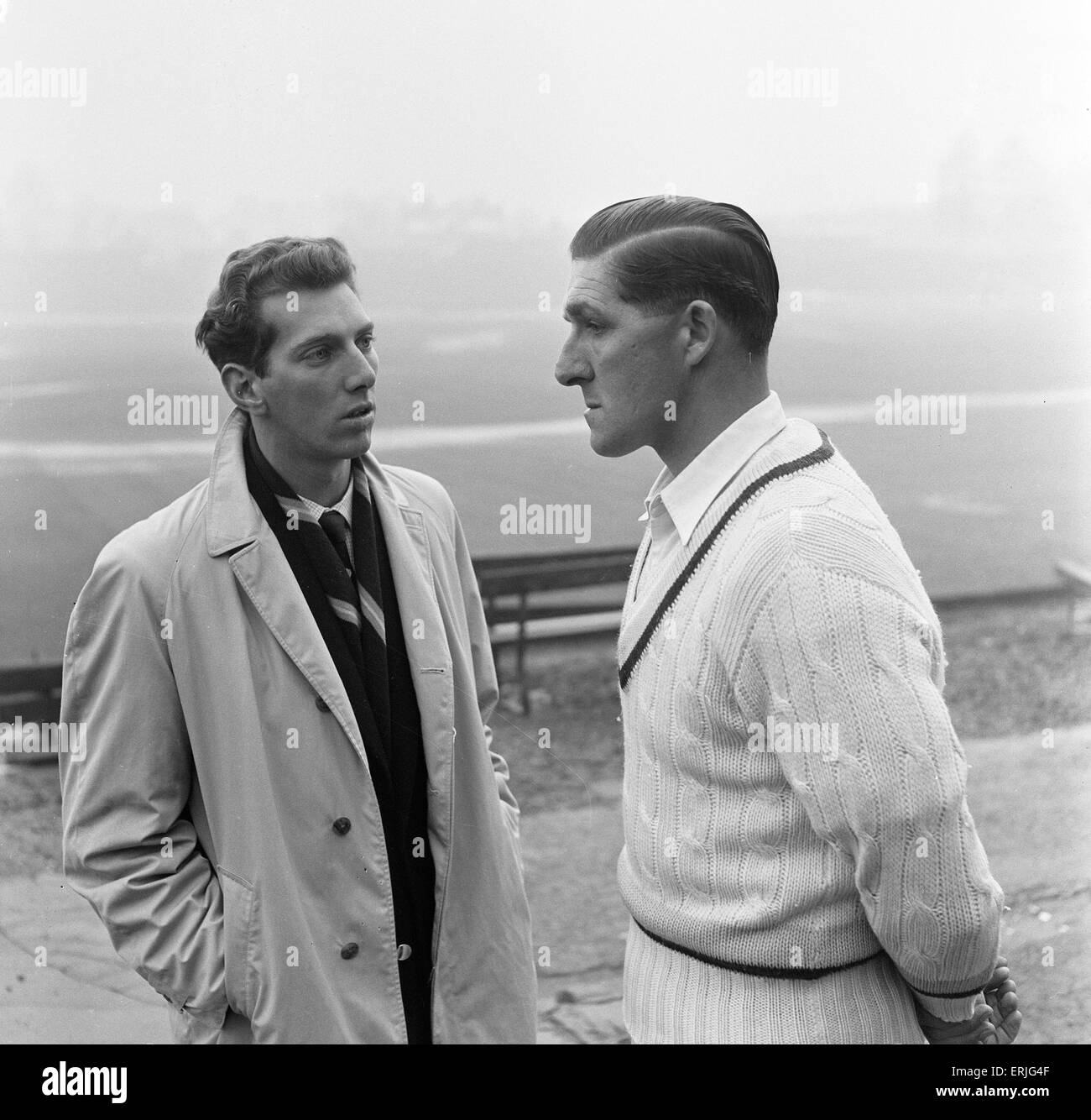 Yorkshire County Cricket Club, players head to the nets with snow still on the ground, 5th April 1961. Don Wilson, back from tour, chats with skipper Vc Wilson. Stock Photo