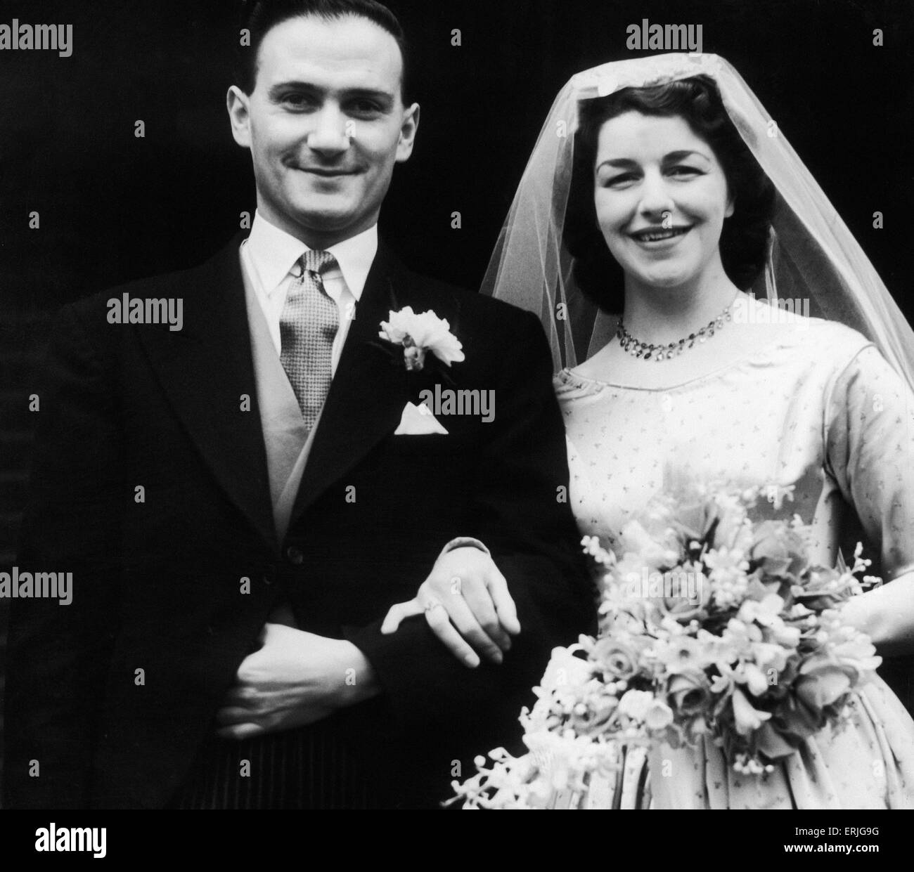 John Vollam Morton younger son of H.V Morton the Birmingham Journalist who became famous for his books on travel. (Picture) John Vollam Morton on his wedding day with wife former Miss Anne Kenrick Lewis daughter of Mr and Mrs. J. Kenrick Lewis. of Alderbrook Road, Solihull. 20th March 1954. Henry Vollam Morton Stock Photo