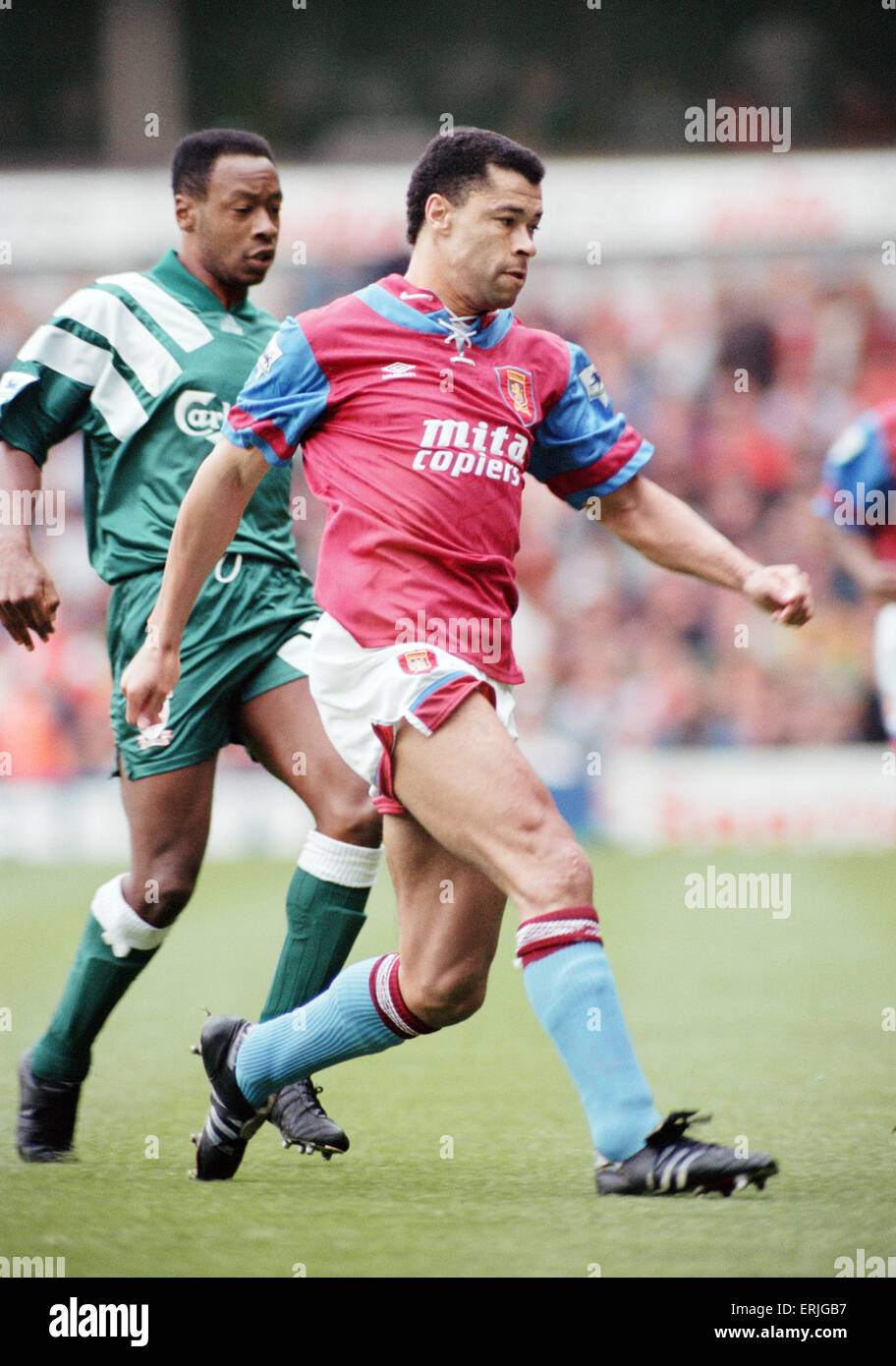 Aston Villa footballer Paul McGrath in action during their Premier league match against Liverpool at Villa Park, challenged by Mark Walters. 19th September 1992. Stock Photo