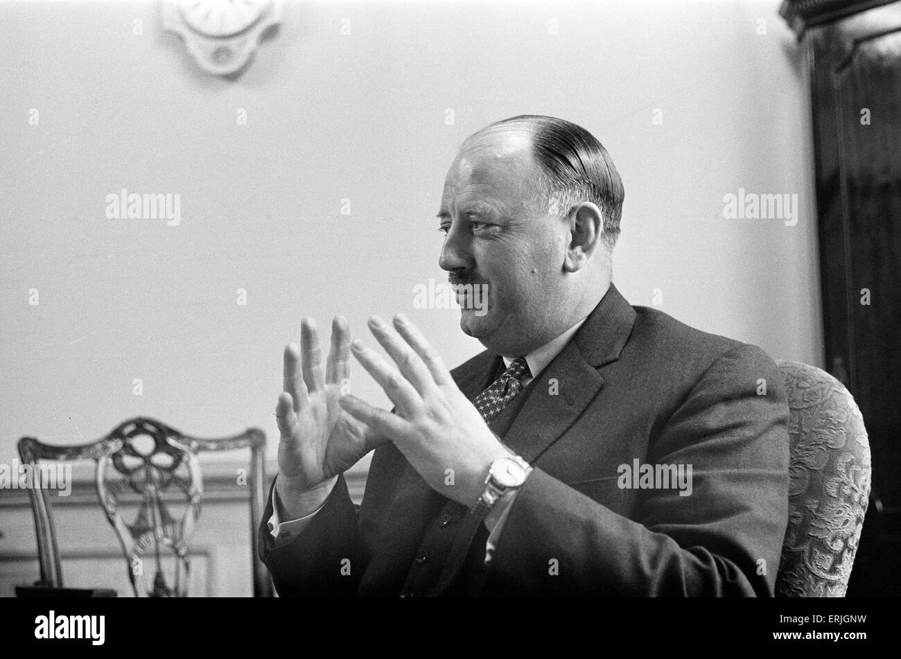 Dr Richard Beeching, Chairman of British Railways, pictured in his office, 15th March 1961. He became a household name in Britain in the early 1960s for his report 'The Reshaping of British Railways', commonly referred to as 'The Beeching Report', which led to far- reaching changes in the railway network, popularly known as the Beeching Axe. Source Wikipedia. Stock Photo