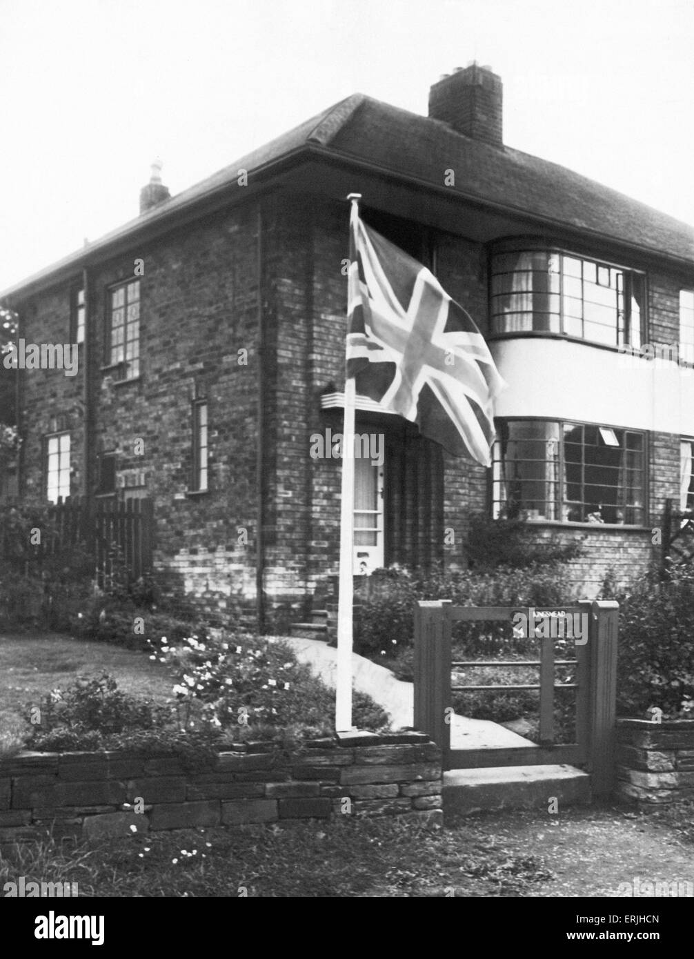 Australian cricket tour of England for the Ashes. The home of Len Hutton is Pudsey, Yorkshire, filies  the Union Jack flag after victory in the fifth and final test match at the Oval won the Ashes for England. 20th August 1953. Stock Photo