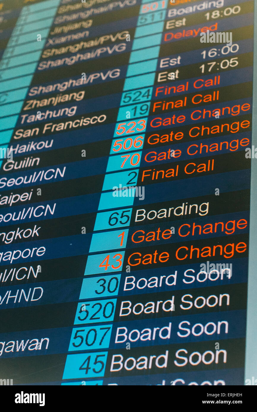 Hong Kong airport information board with flights information Stock