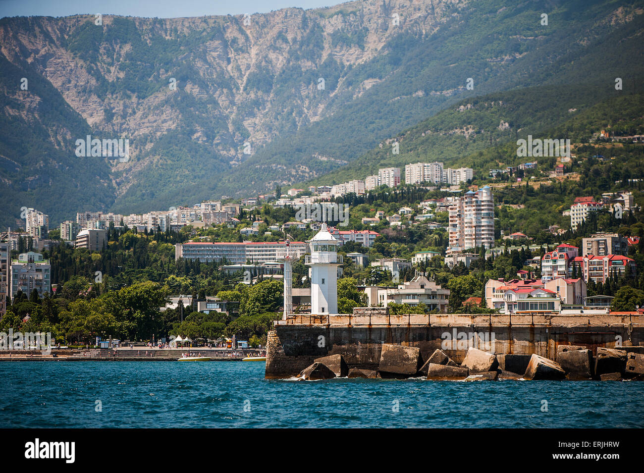 Yaltinsky white lighthouse on embankment of Yalta, Russia, Crimea Stock