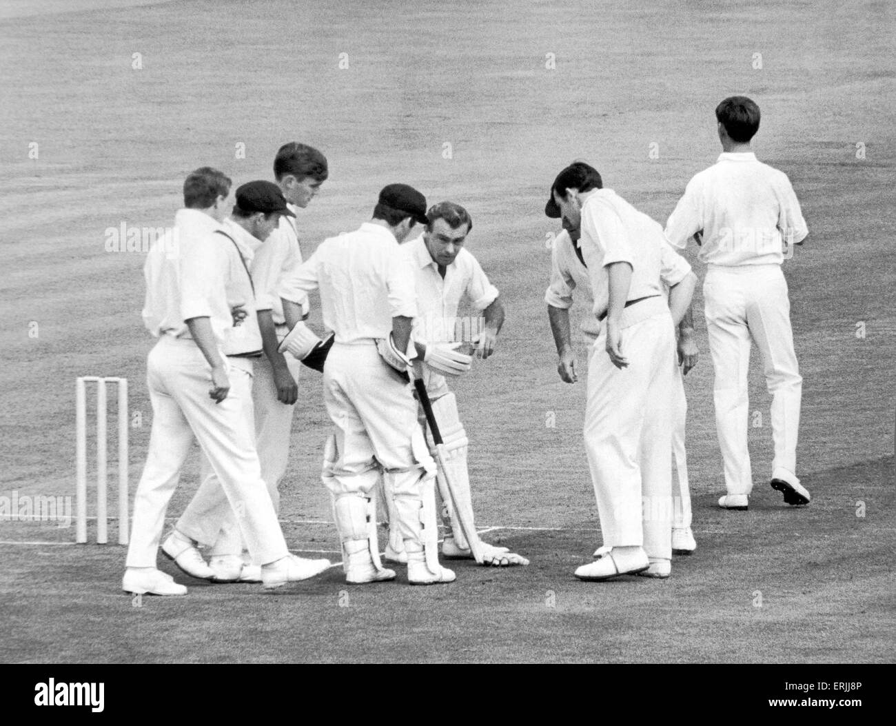 Australian cricket tour of England for the Ashes. England v Australia 3rd Test at Edgbaston. Australian players gather around Edrich after he head been rapped on the hand by Freeman. 12th July 1968. Stock Photo