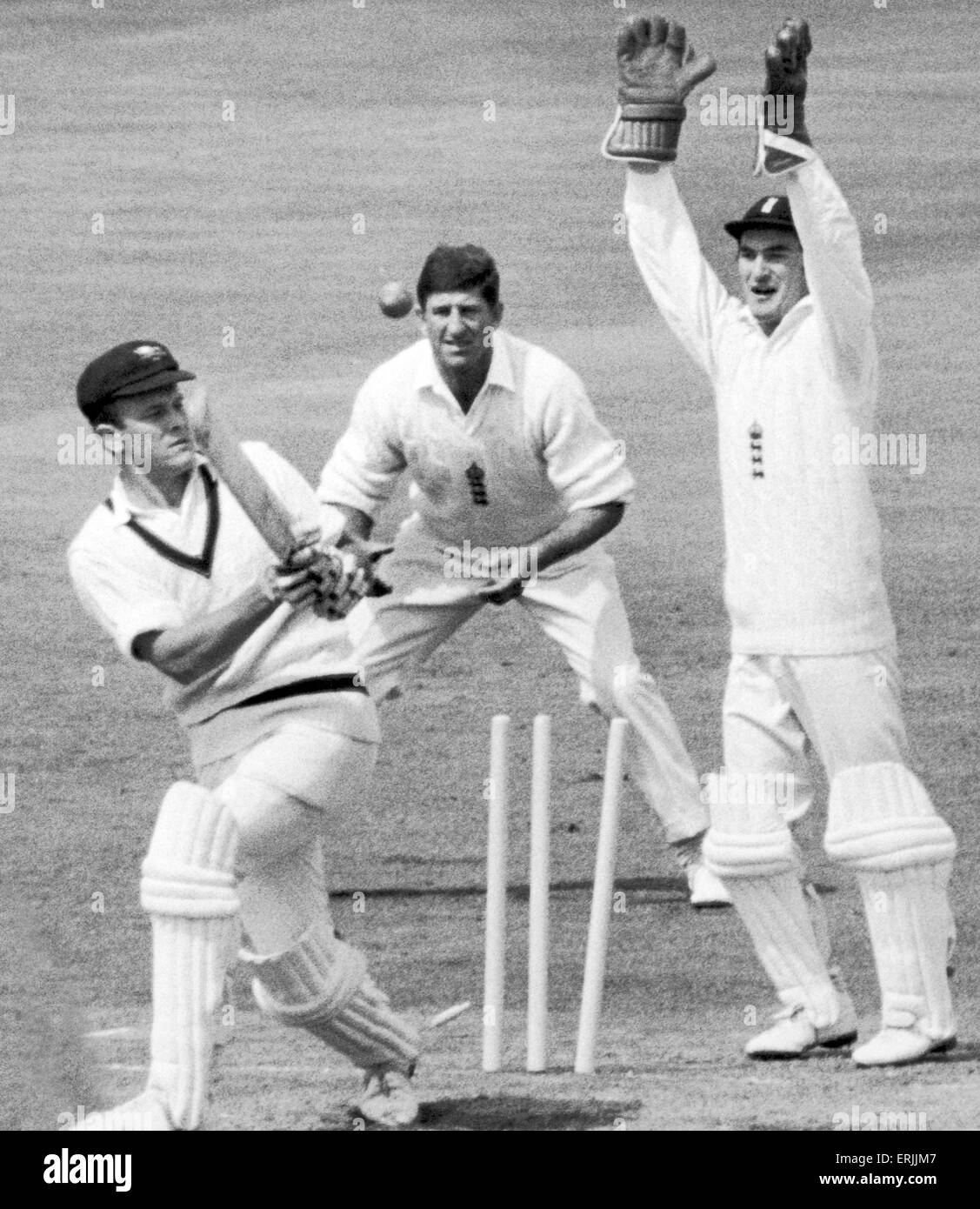 Australian cricket tour of England for the Ashes. England v Australia 3rd Test match at Edgbaston. England claim the wicket of Alan Connolly in the first innings, with wicket keeper Alan Knott and slip fielder Ken Barrington celebrating bowler Ray IllingworthÕs successful delivery.    July 1968. Stock Photo