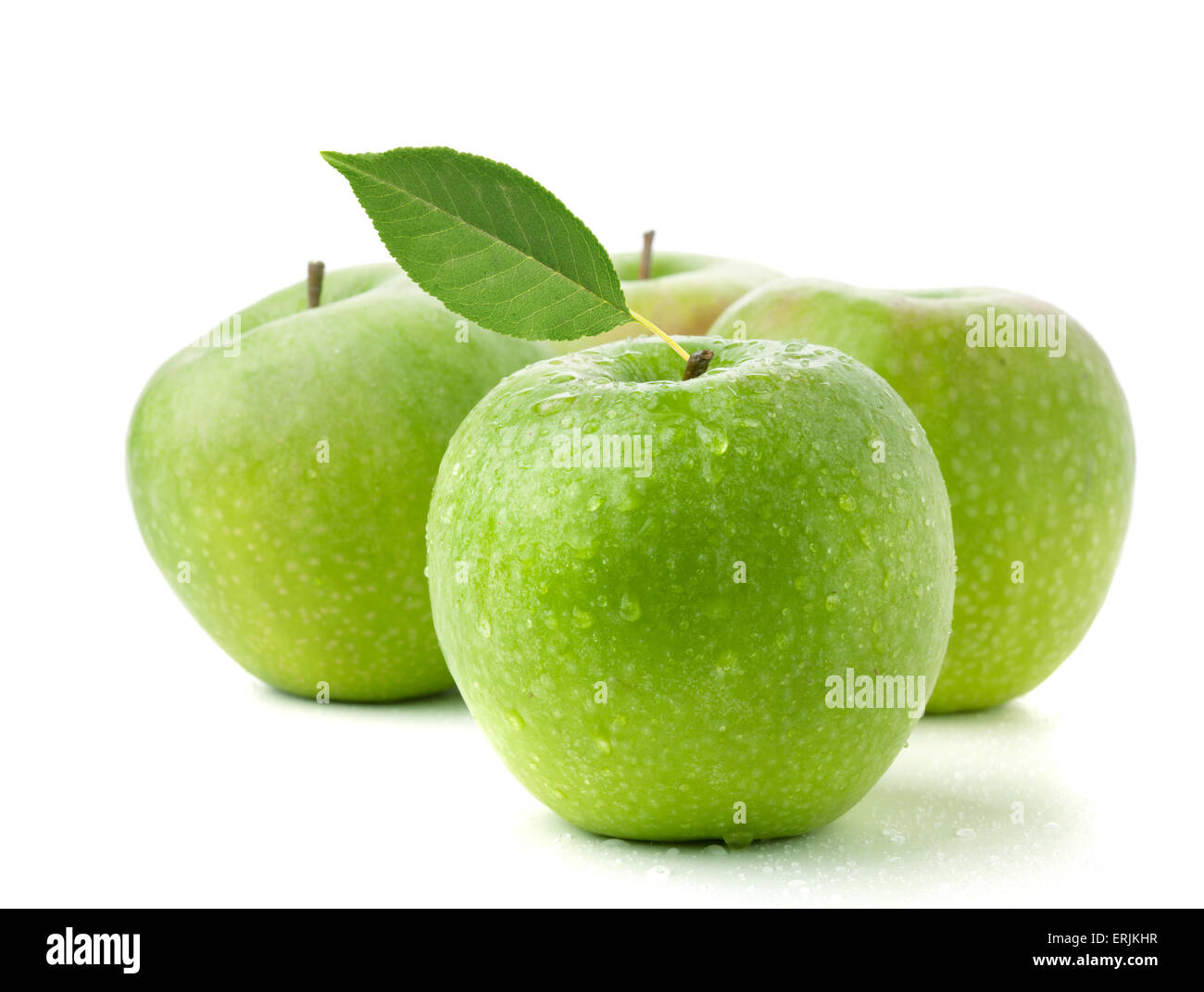 Four ripe green apples. Isolated on white Stock Photo