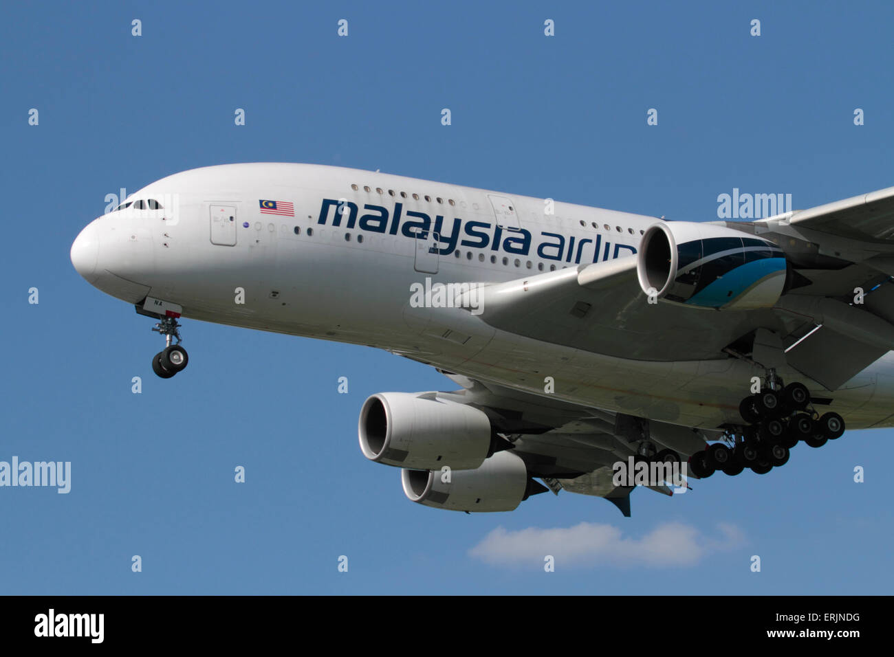 Closeup of a Malaysia Airlines Airbus A380 superjumbo airliner on approach. Modern civil aviation. Stock Photo