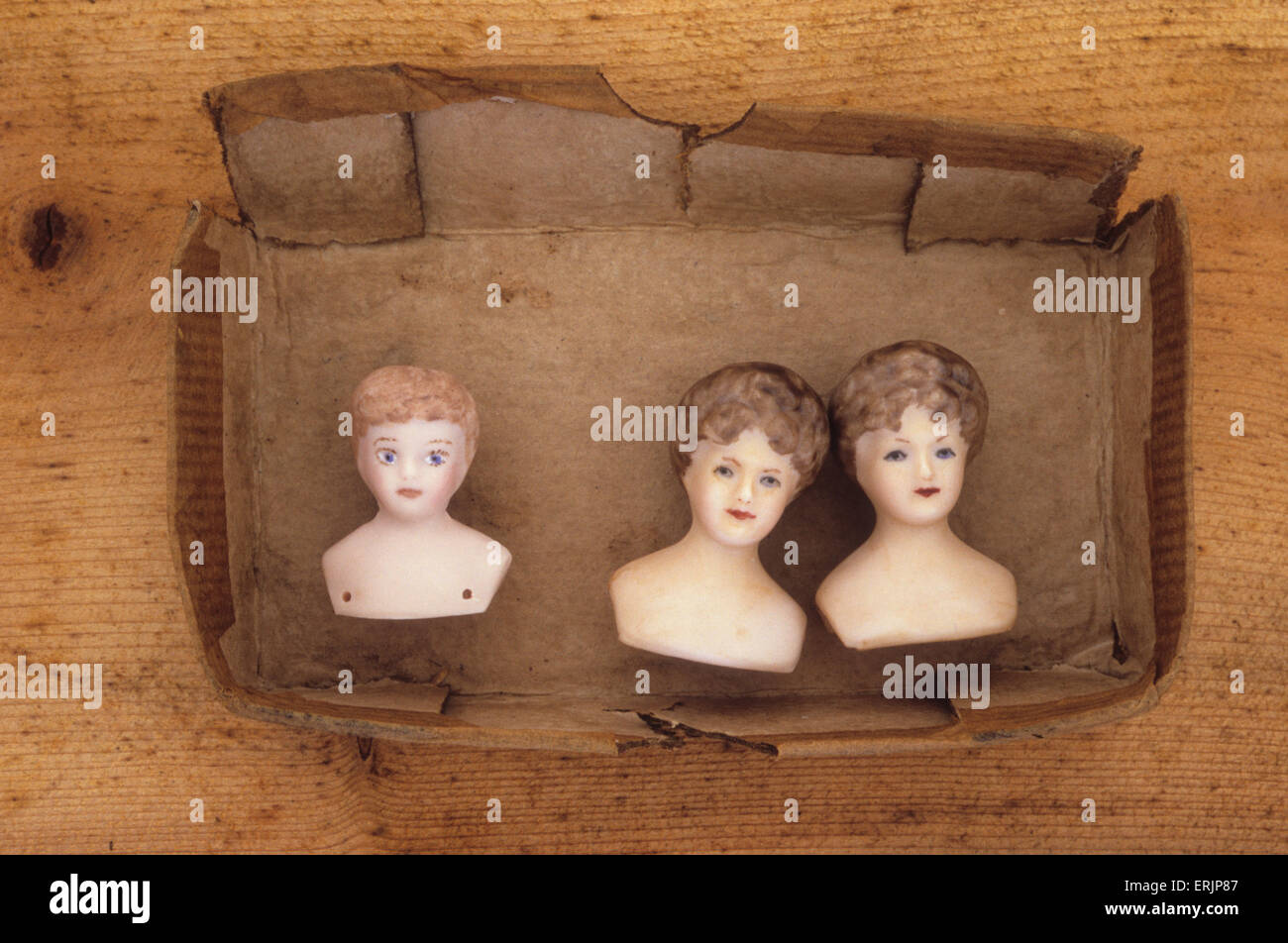 small porcelain doll heads