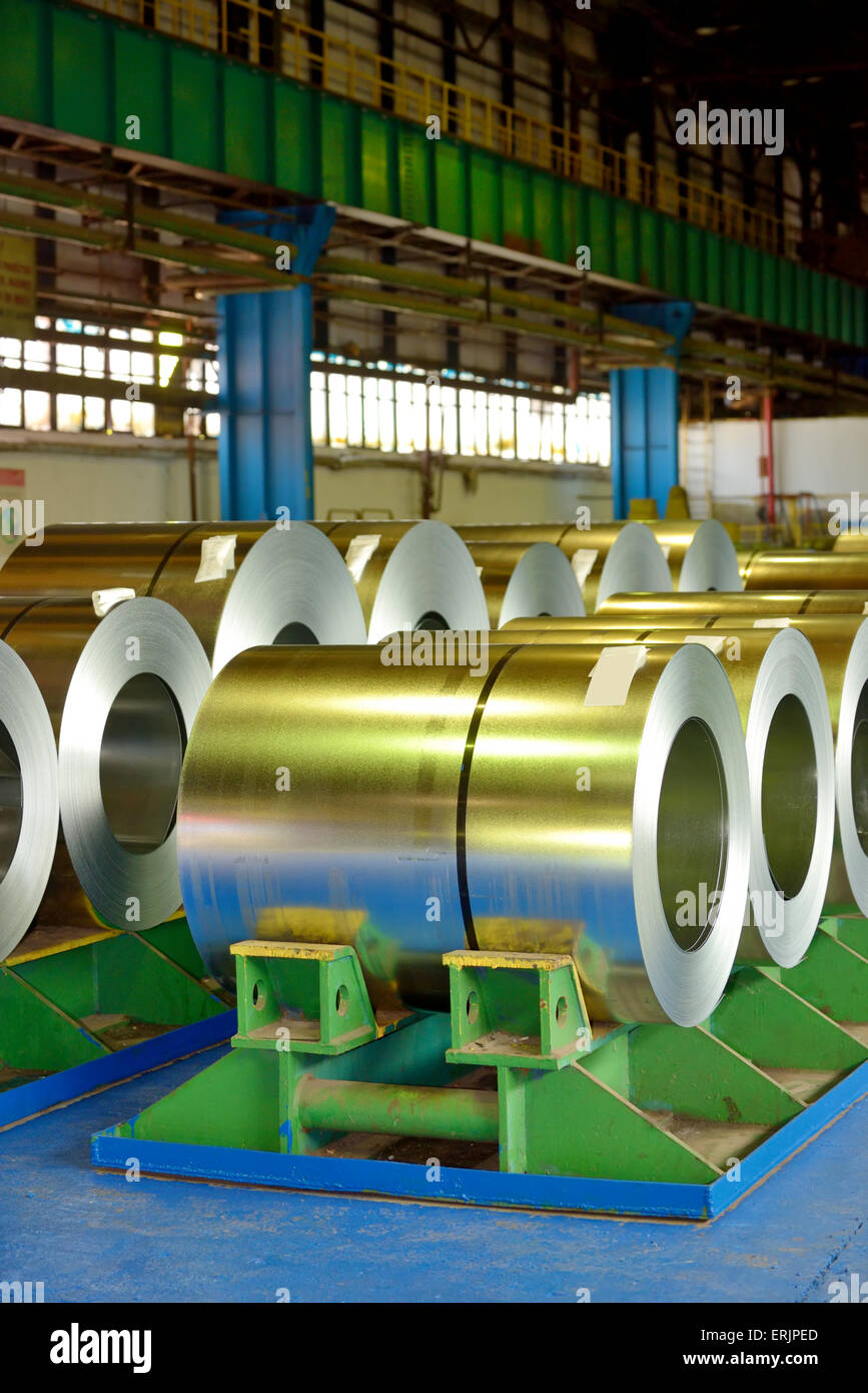 rolls of steel plate stored in warehouse Stock Photo Alamy