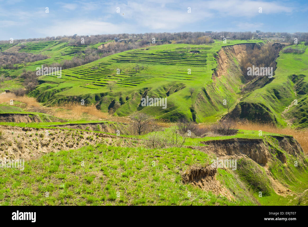 Early spring landscape with soil erosion in Ukraine. Stock Photo