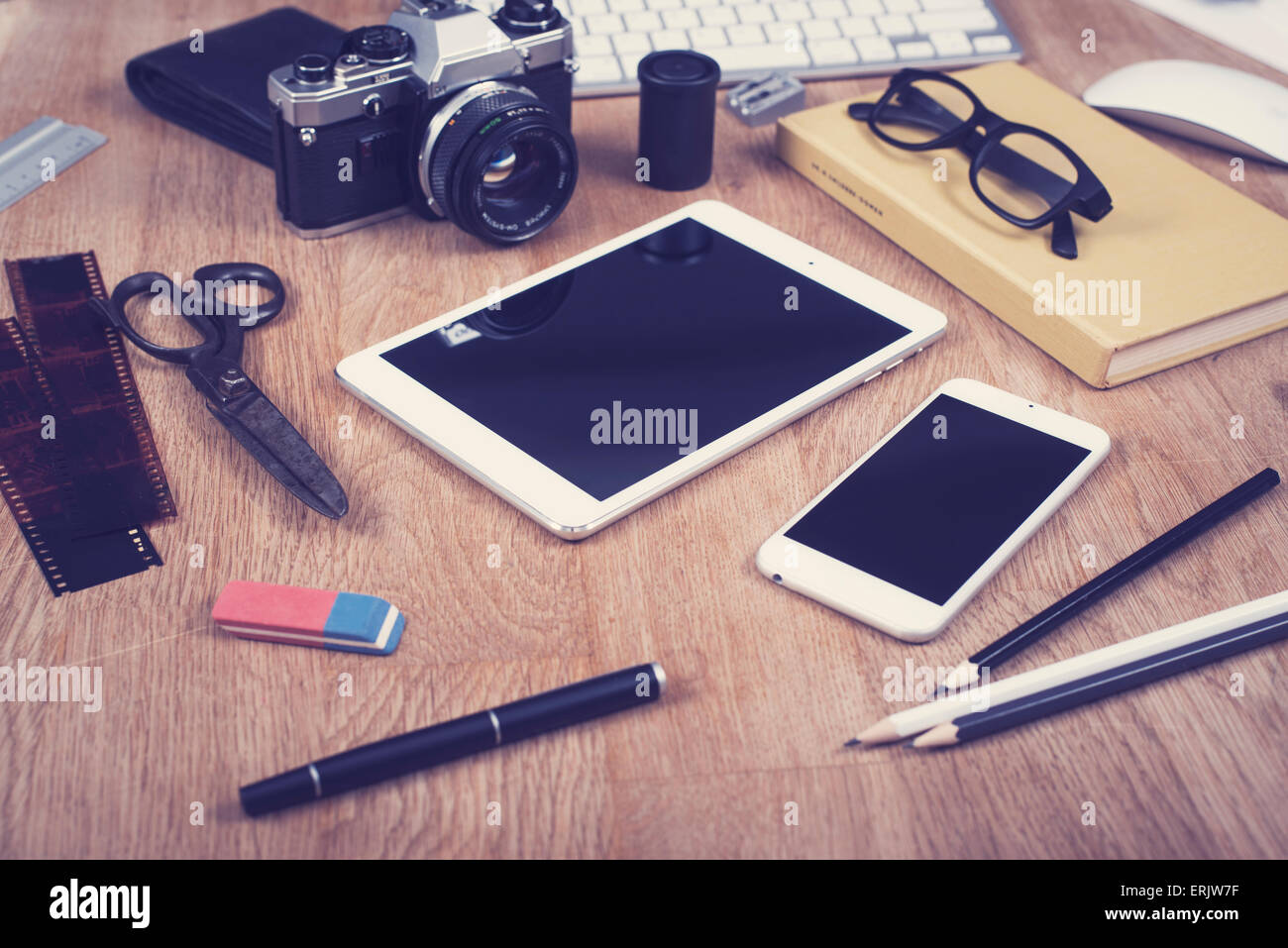 Vintage style responsive webdesign mockup with tablet and smartphone Stock Photo