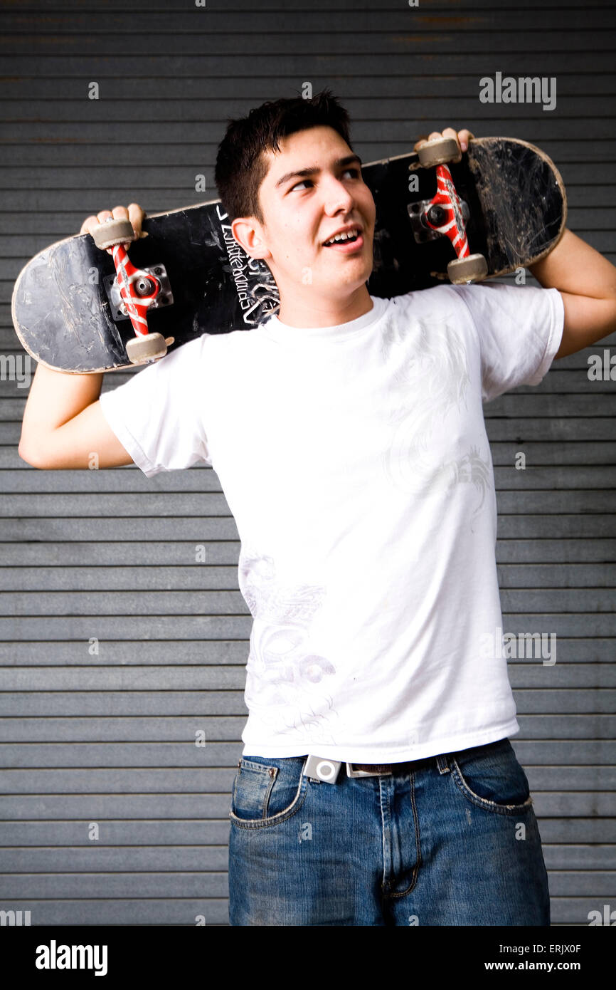Portrait of a skateboarder in an urban enviroment. Stock Photo