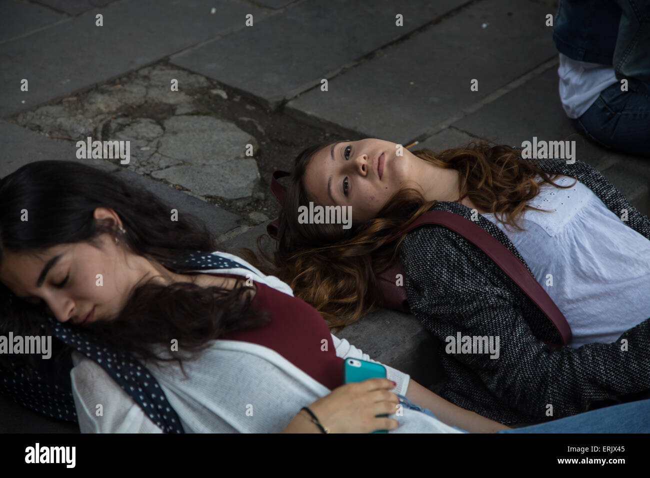 Ankara, Turkey. 01st June, 2015. Two girls play dead near the spot of