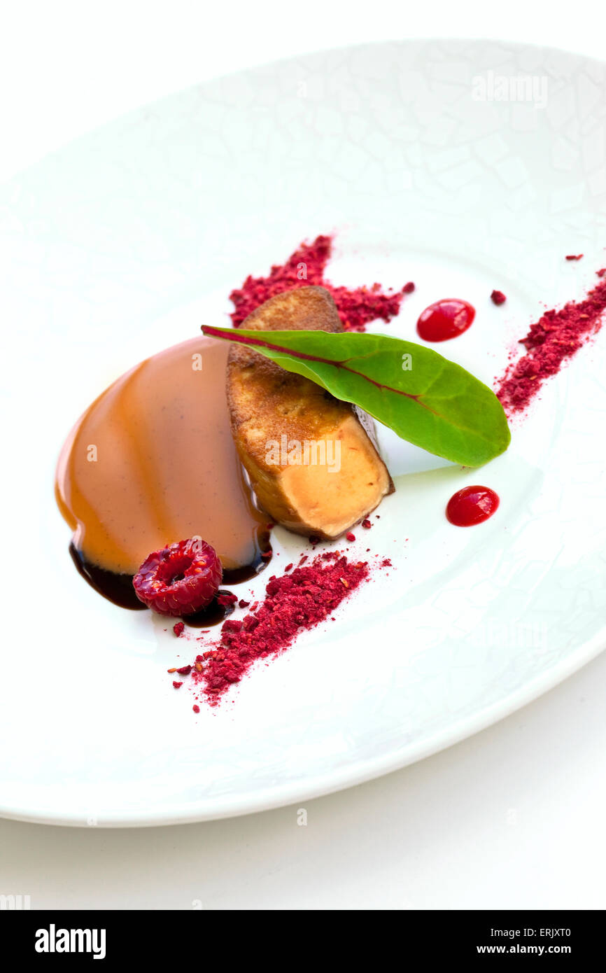 Foie gras, raspberries, milk jam and balsamic vinegar Stock Photo