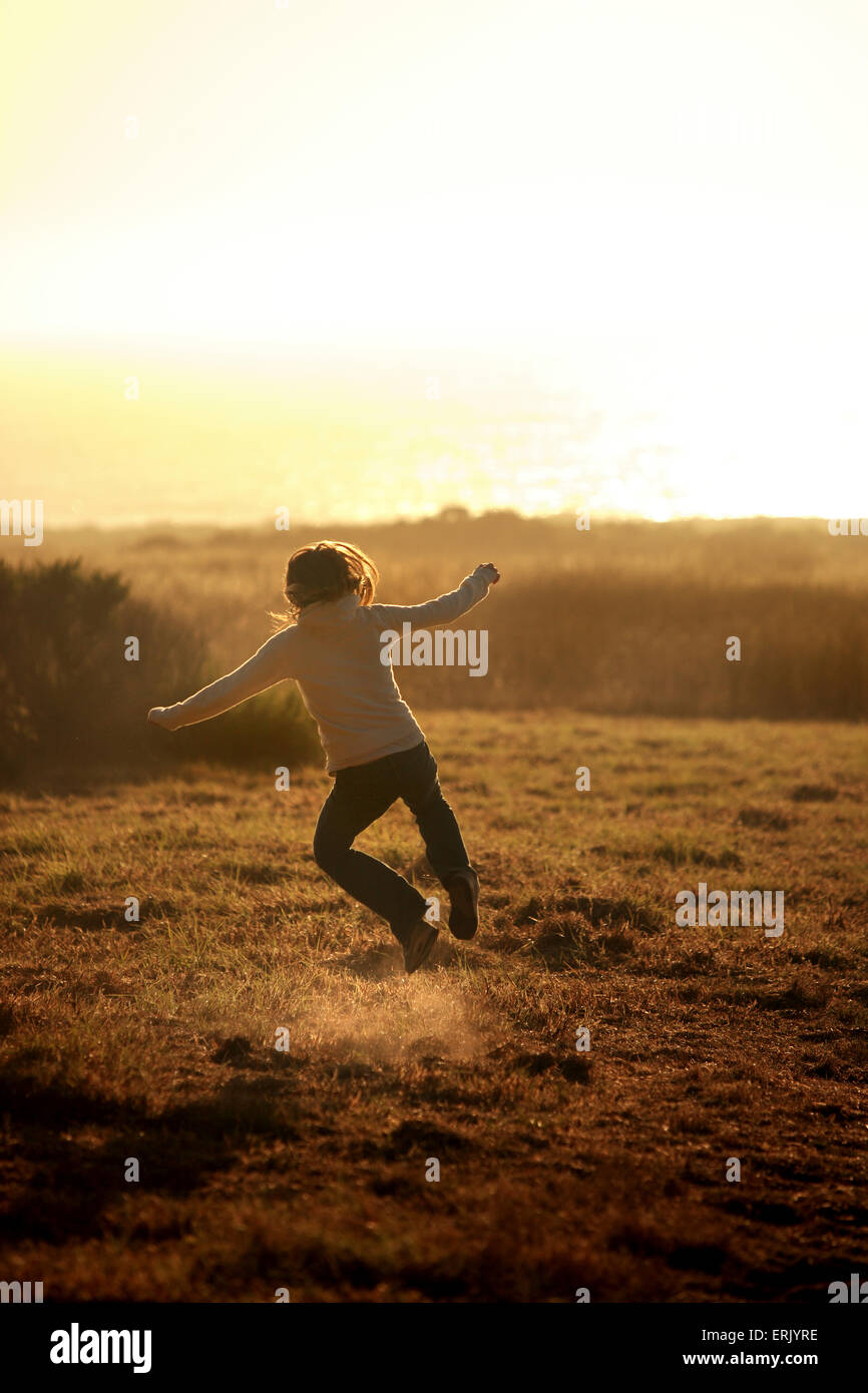 Woman clicking heels Stock Photo Alamy