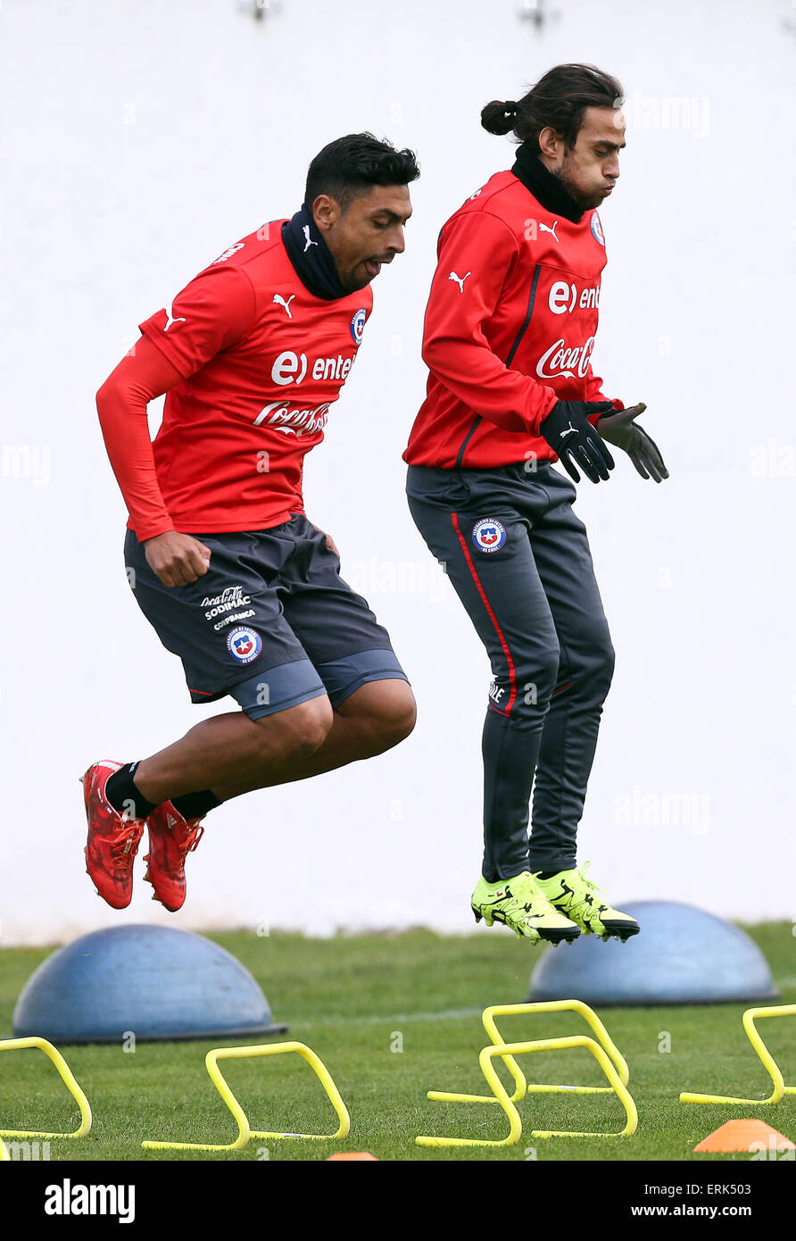 Santiago, Chile. 3rd June, 2015. Gonzalo Jara (L) and Jorge Valdivia of Chile attend a training session in Santiago, capital of Chile, on June 3, 2015. Chile's national soccer team is preparing for the upcoming 2015 Copa America, which will be held from June 11 to July 4 in Chile. © ANFP/Xinhua/Alamy Live News Stock Photo