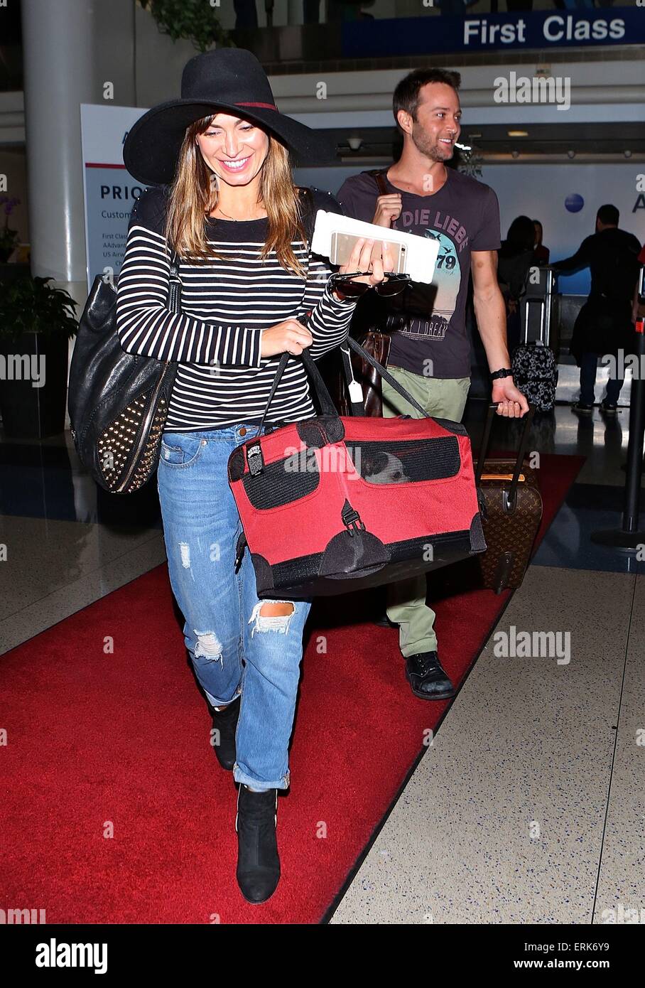 Karina Smirnoff arrives at Los Angeles International (LAX) airport with