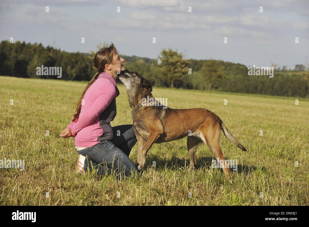 Dog licks woman hi-res stock photography and images - Alamy