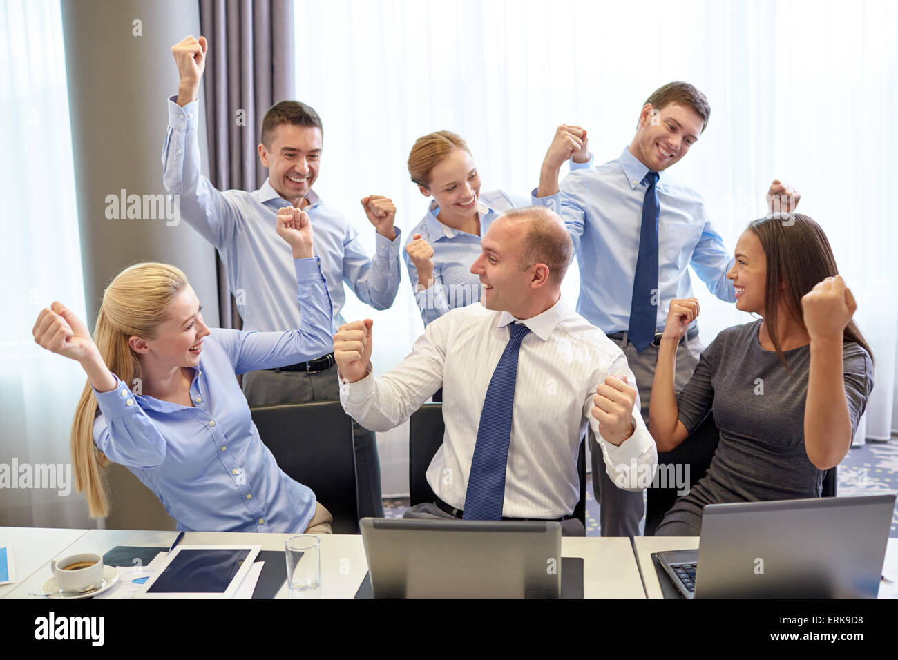 business people celebrating victory in office Stock Photo - Alamy