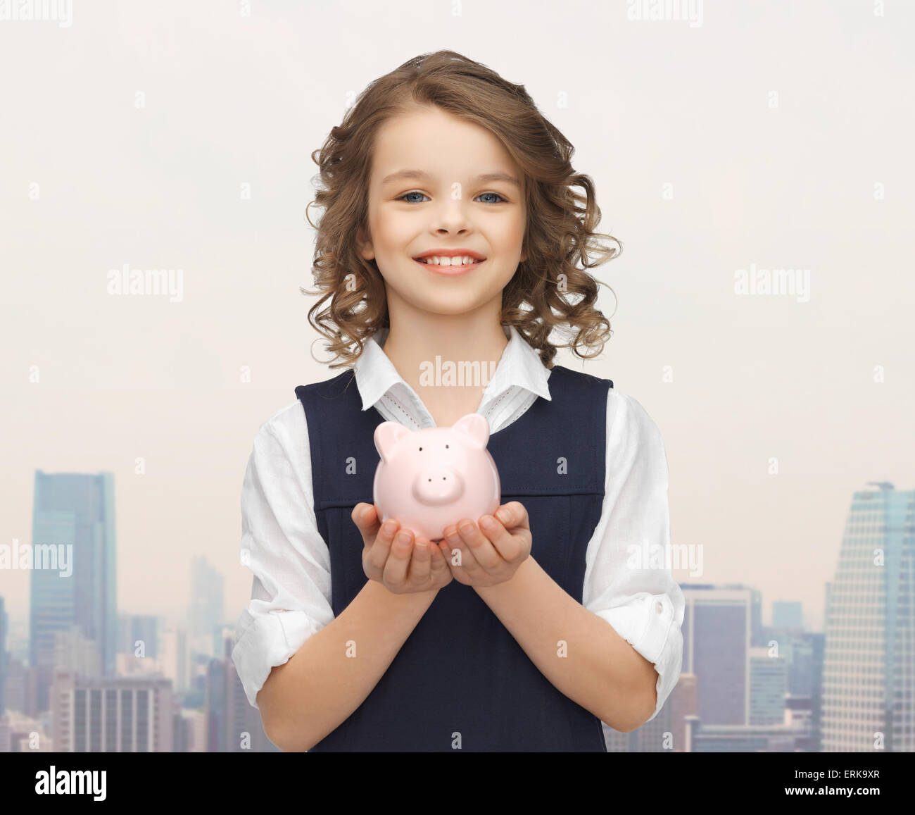 happy girl holding piggy bank on palms Stock Photo - Alamy