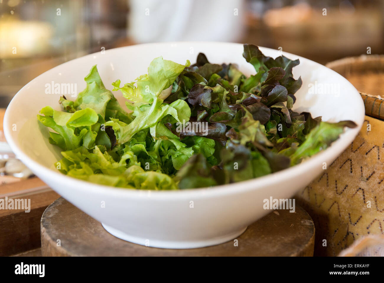 bowl of green salad lettuce at asian restaurant Stock Photo Alamy