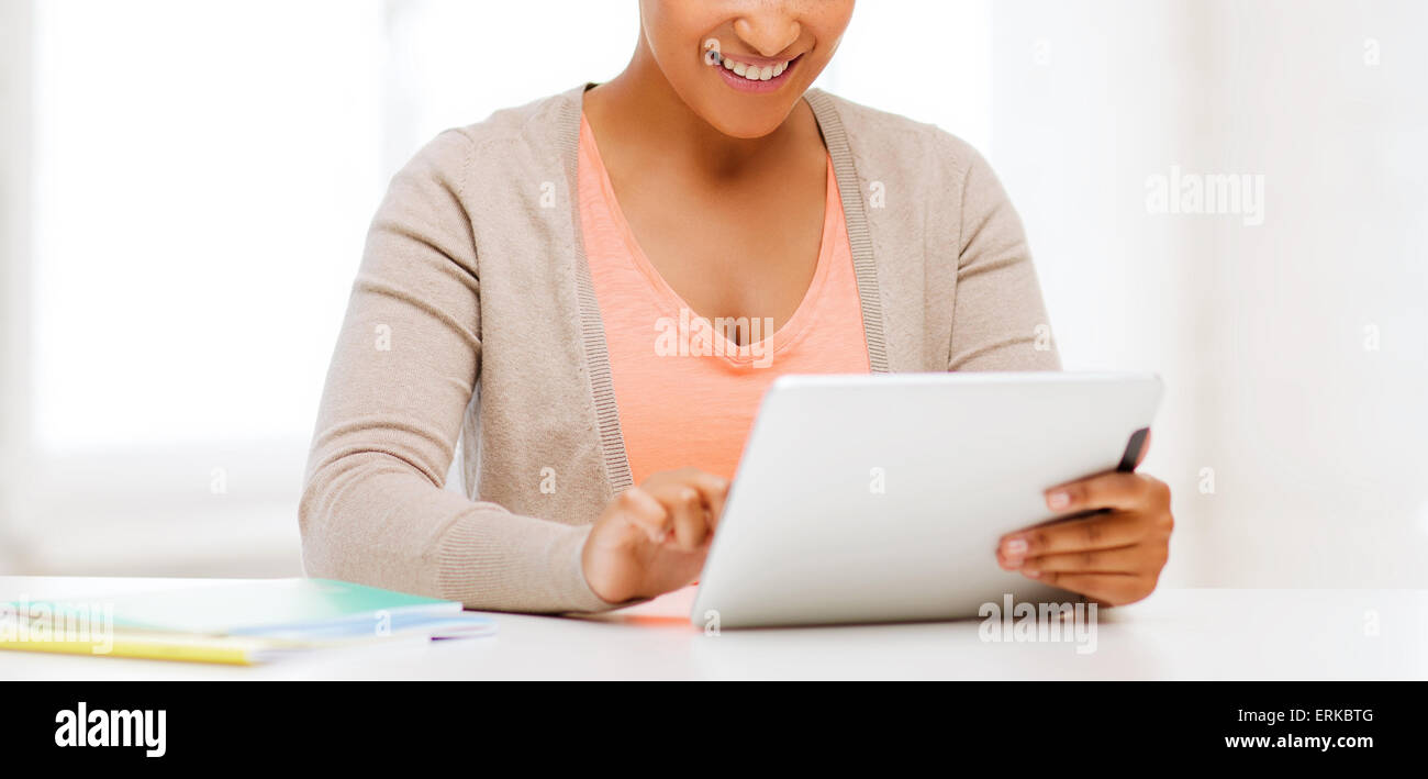 smiling student girl with tablet pc Stock Photo - Alamy