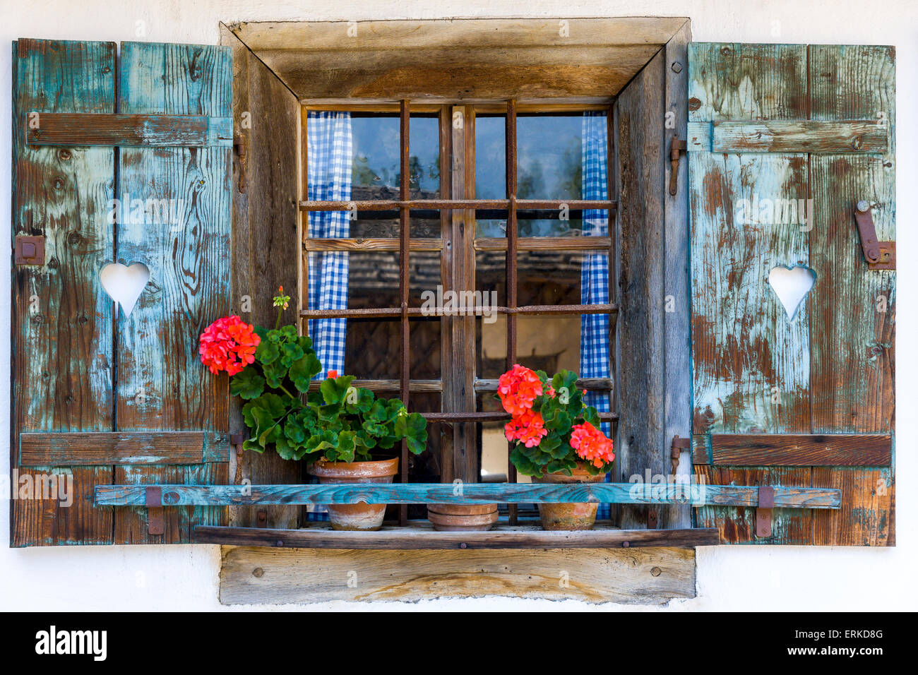 Window of an old farmhouse decorated with geraniums, Salzburg State ...