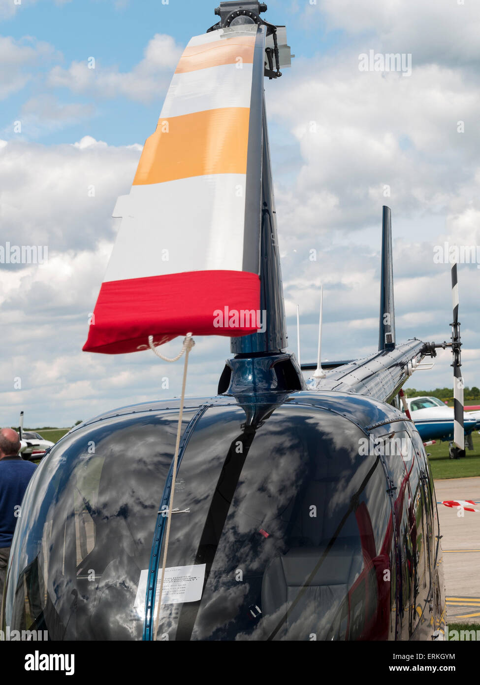 the main rotor of a Robinson two-seater leisure helicopter,at Aerexpo 2015 aviation event,at Sywell airfield,Northamptonshire, B Stock Photo