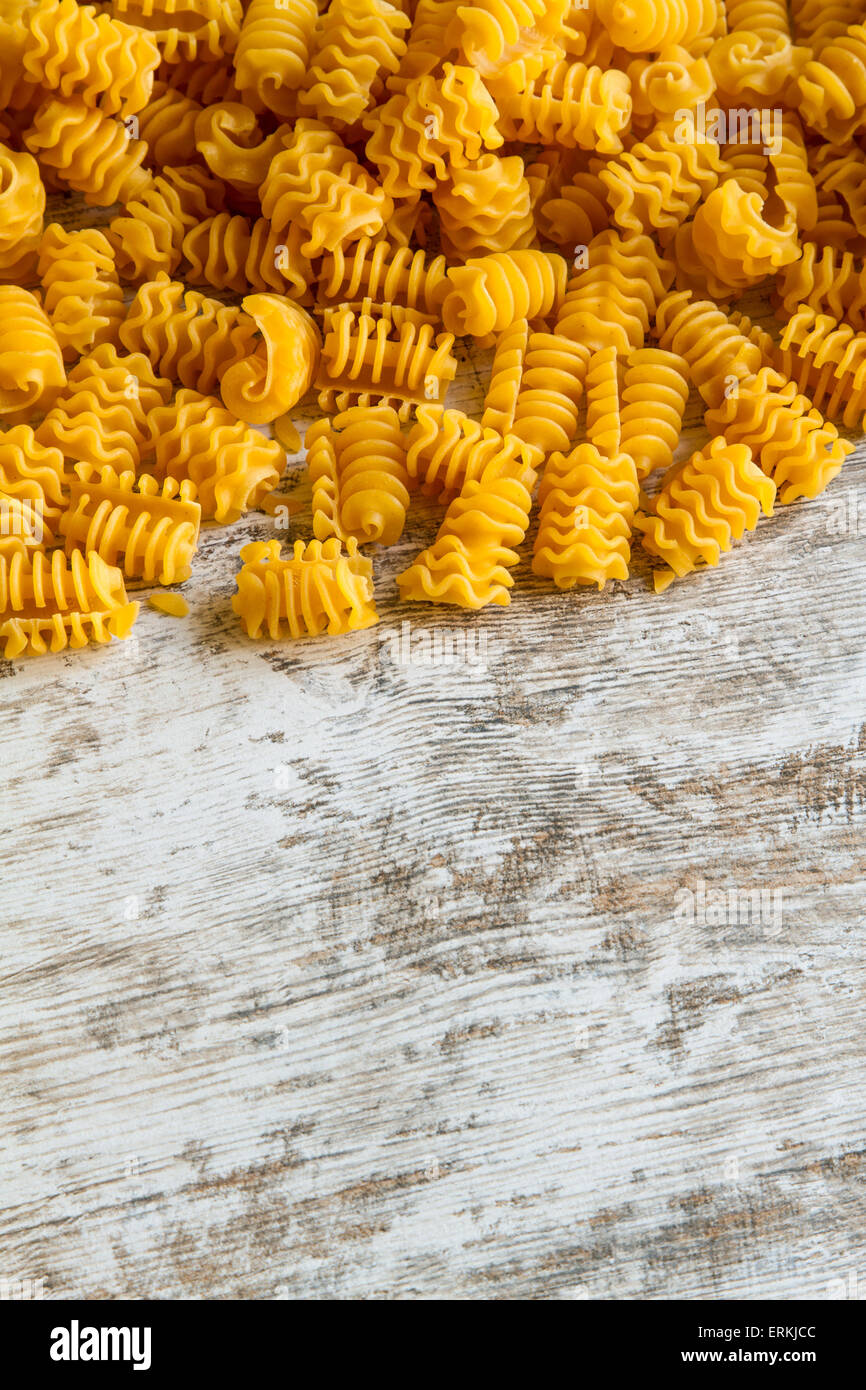 Preparing Radiatori, egg pasta background Stock Photo