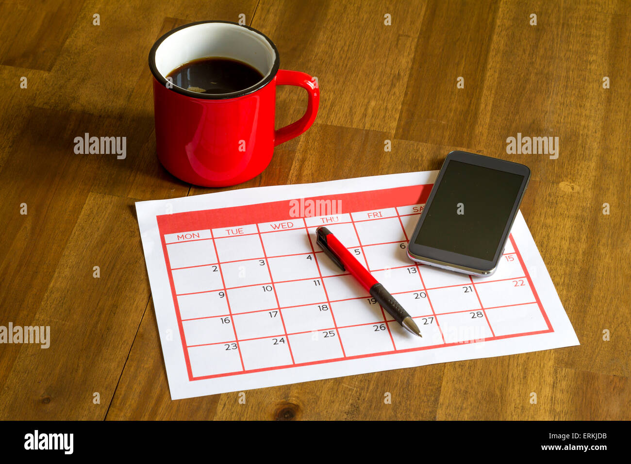 Organizing monthly activities and appointments in the calendar Stock Photo