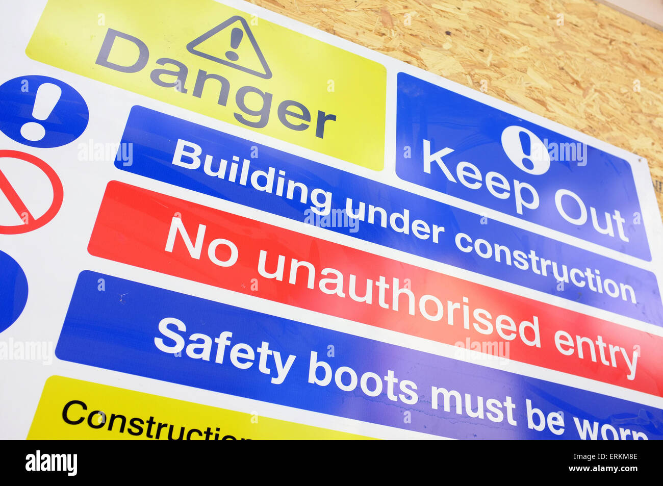 A safety warning sign on the outside of a construction site in Bristol ...